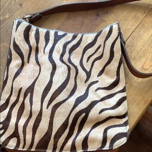 Two Bar West hair on hide bag Strap not removable